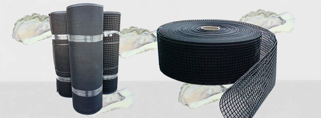 Three rolls of oyster mesh are upright on the left and a roll of tubular oyster mesh on the right.