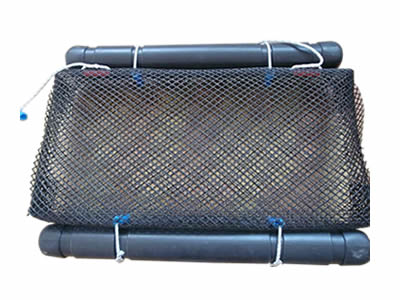 A black oyster mesh bag with two black cylinder air rubber floats on its either side.